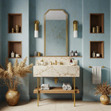 This marble vanity showcases Calacatta Gold stone with brass legs and a wooden shelf.