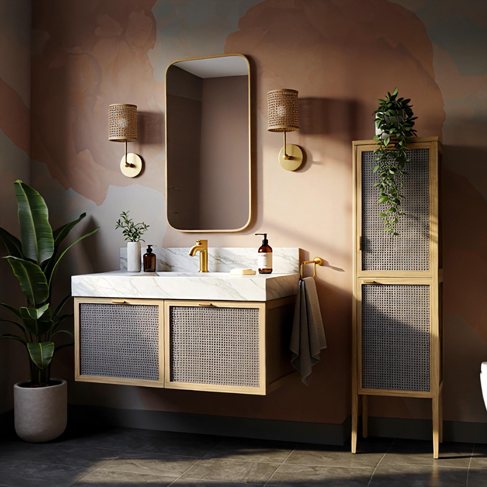 Wall-mounted Carrara marble sink paired with minimalist rattan cabinet doors and soft golden accents.