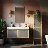 A floating marble vanity with brass faucet and dual rattan cabinets in a modern bathroom interior.