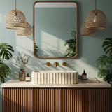 A rectangular fluted travertine vessel sink atop a ribbed wooden vanity in a tropical-inspired luxury bathroom.