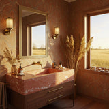 A luxurious pink violet marble vanity with brass fixtures and a walnut wood cabinet in natural daylight.