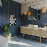 This travertine vanity with cane cabinet doors features a sculptural stone sink ideal for luxury bathroom interiors.